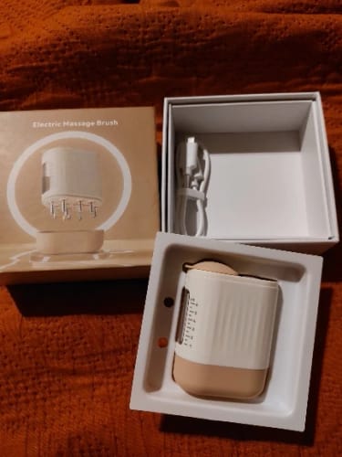 Customer photo review of Microcurrent Red Light Scalp Massager And Hair Oil Applicator For Hair Growth
