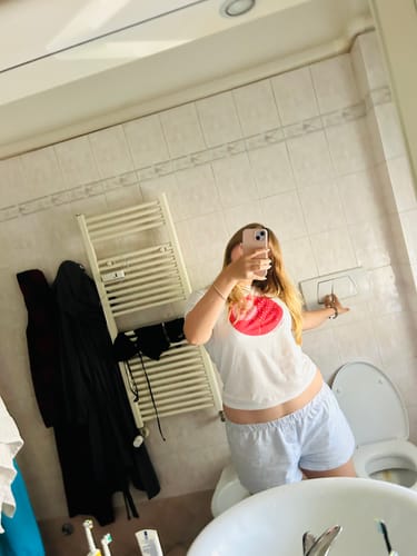 Customer photo review of 'Lucky Shot' baby tee