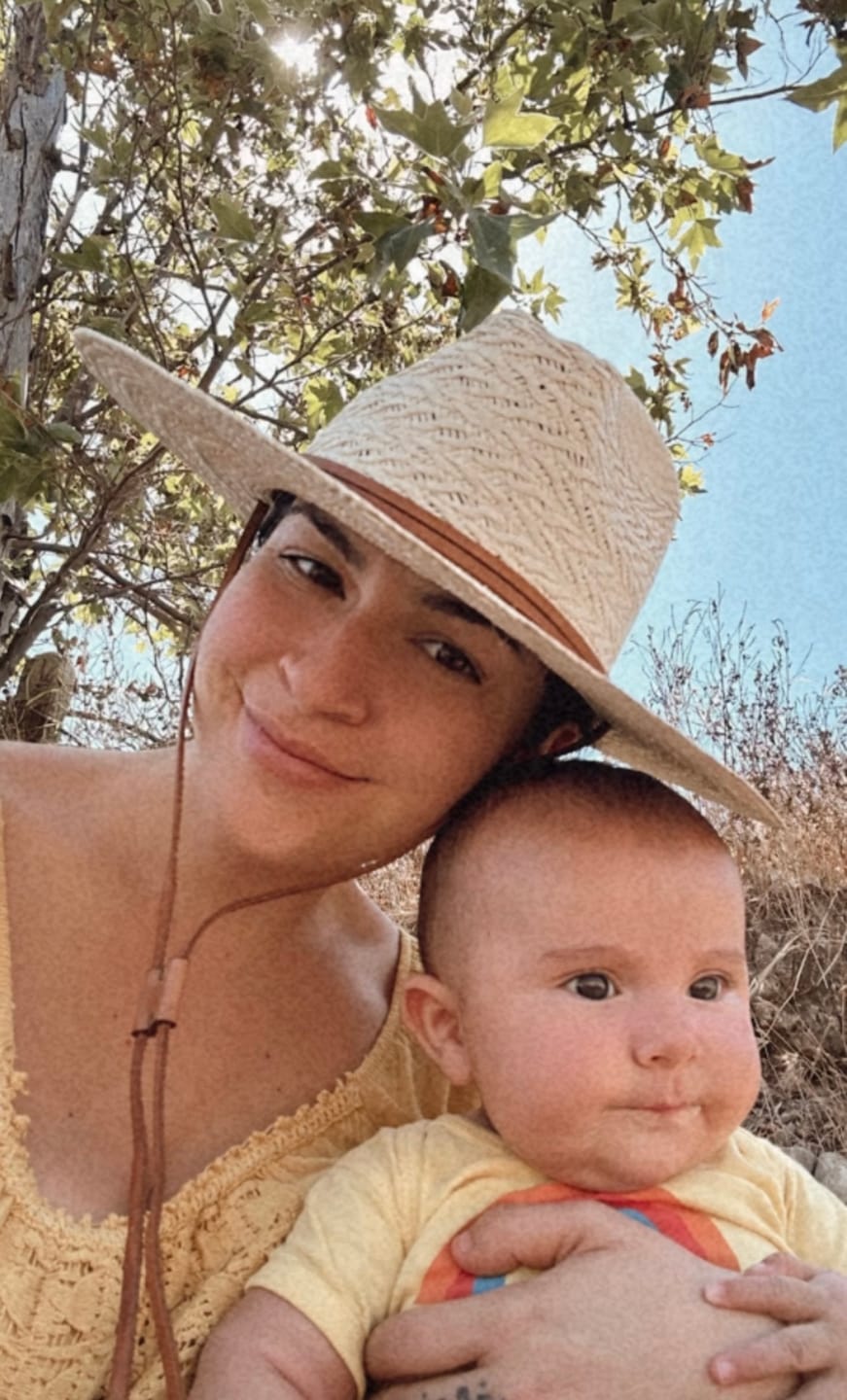 Kristianna G. wearing the Braided Ranchera Straw Hat
