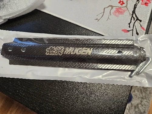 Customer photo review of MGN Carbon Fiber Style Car Battery Tie Down