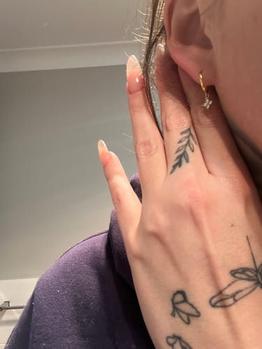 Customer photo review of Clover Sapphire Hoop Earrings