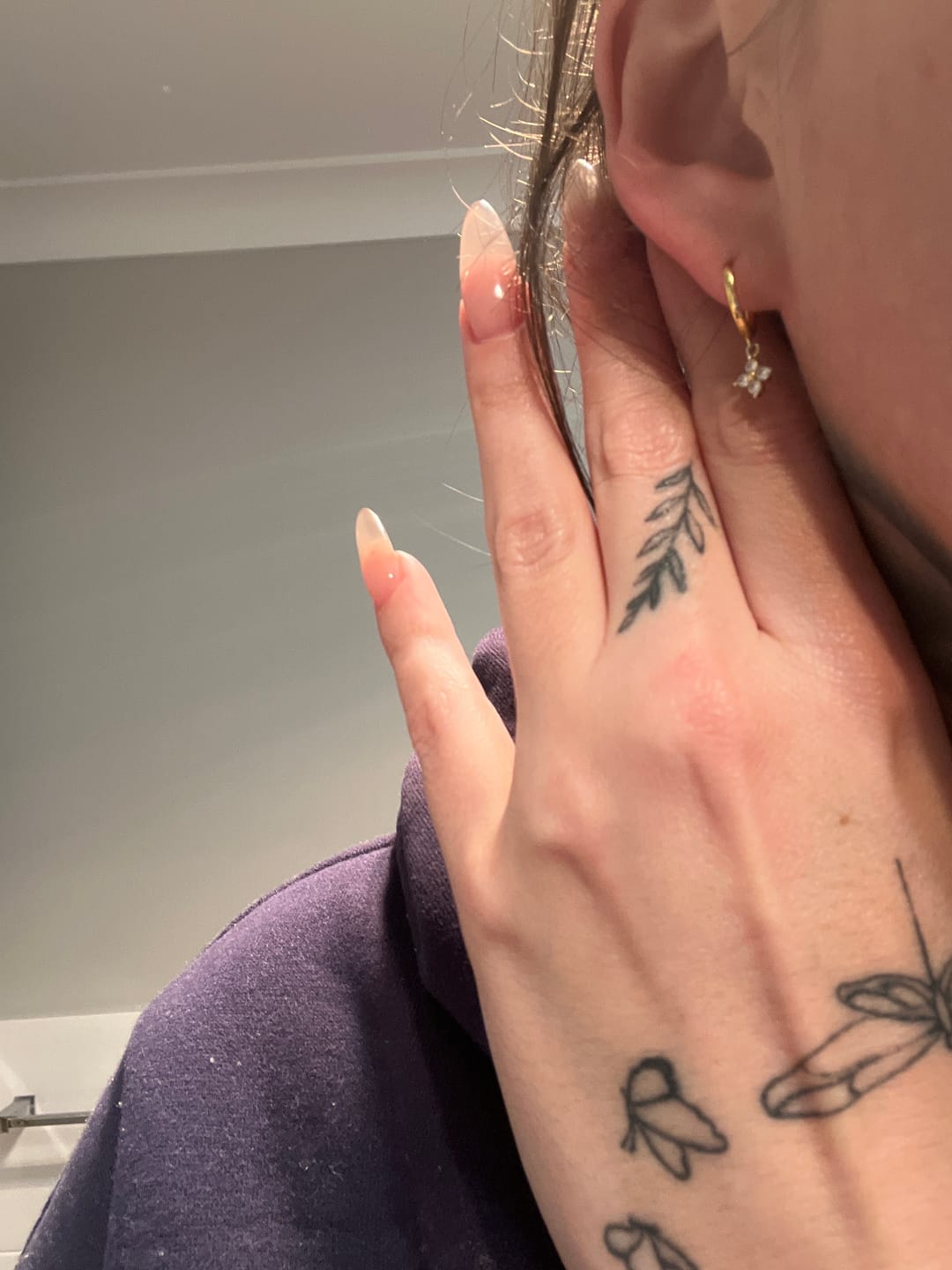 Customer photo review of Clover Sapphire Hoop Earrings