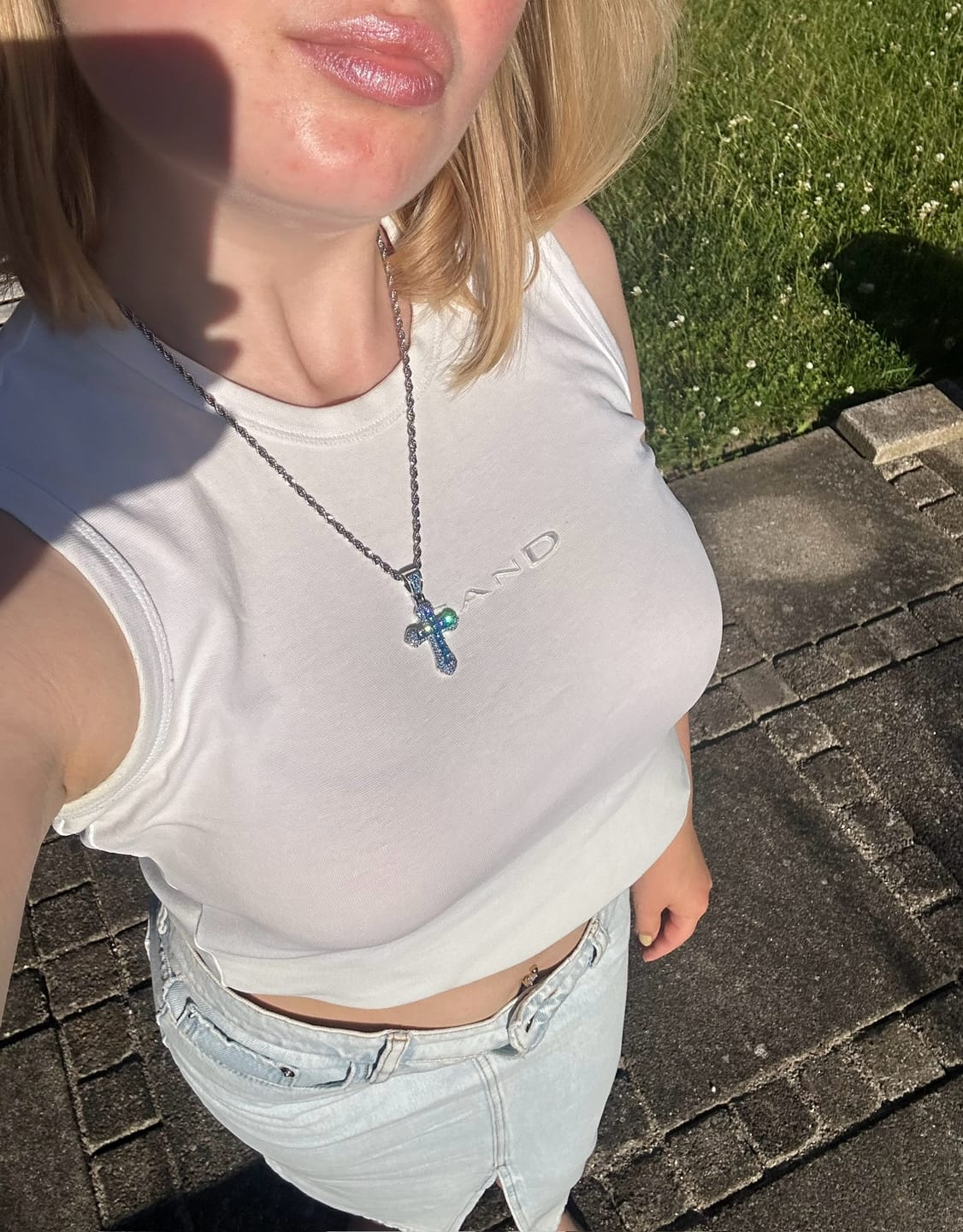 Customer photo review of BLUE CROSS PENDANT. - WHITE GOLD