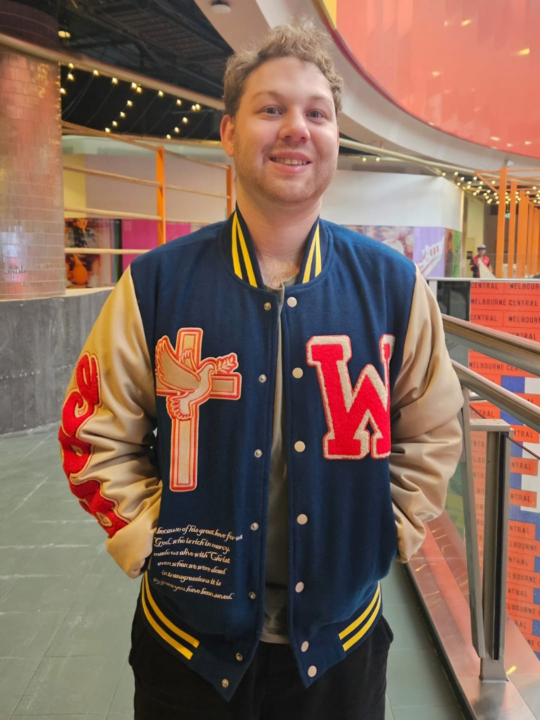 Customer photo review of Navy Grace Varsity Unisex Jacket