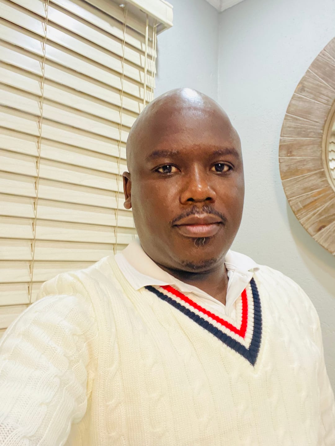 Customer photo review of Cream, Red & Blue Cricket Jersey