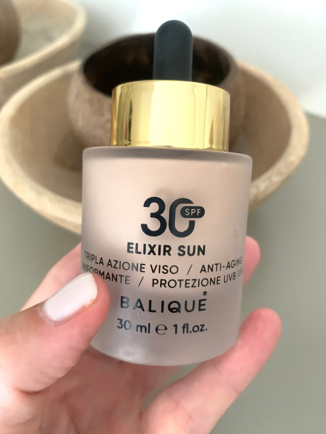 Customer photo review of ELIXIR SUN SPF30 - Siero Viso tripla azione