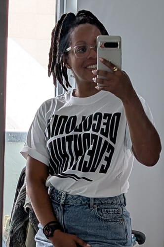Customer photo review of Decolonize Everything Tee