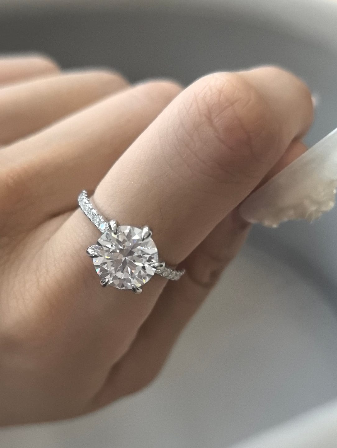 Customer photo review of S925 Moissanite 2.0~4.0 Carat 6 Prong Round Cut Engagement Ring