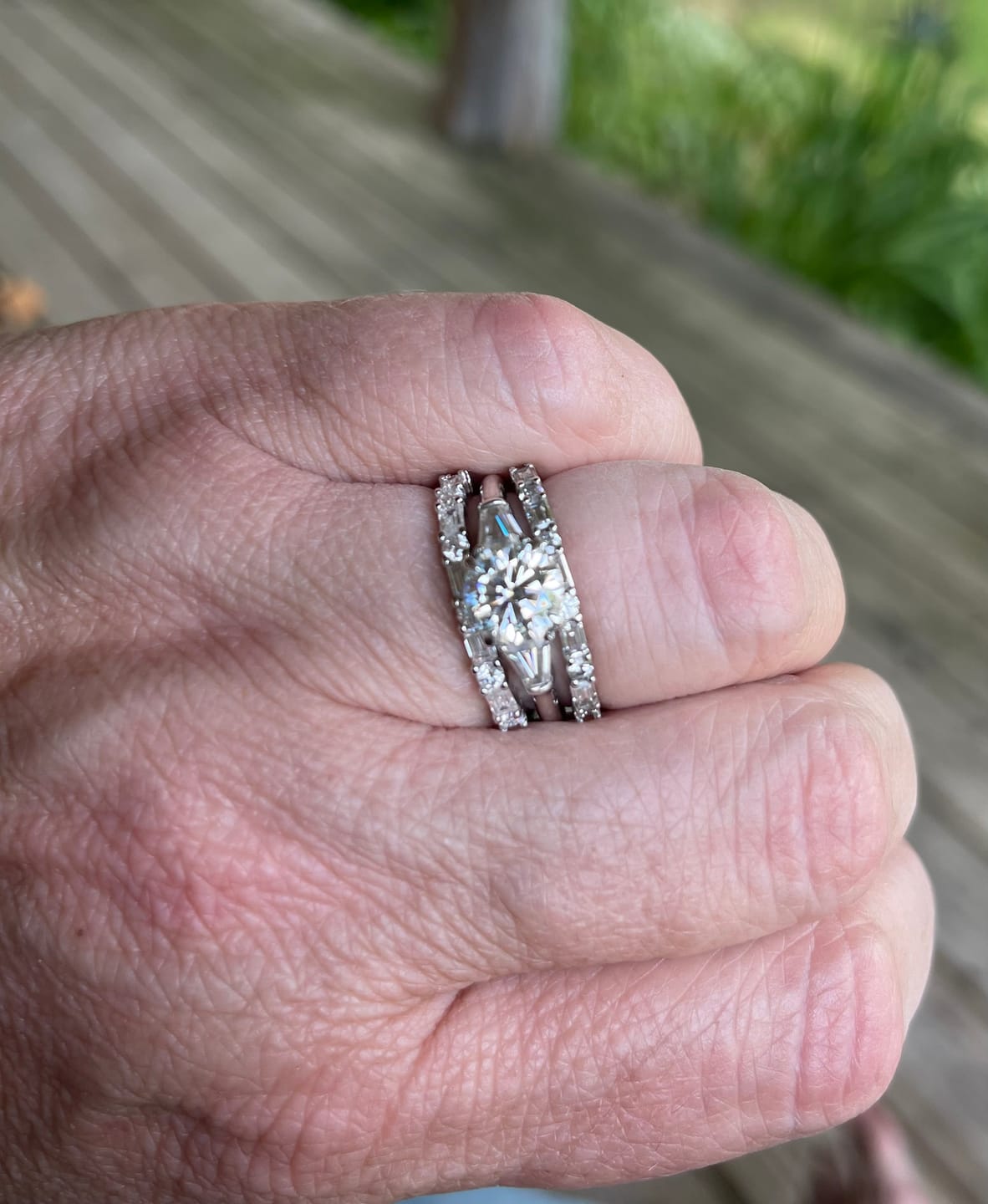 Customer photo review of Alternating Baguette and Round Moissanite Half Eternity Wedding Band
