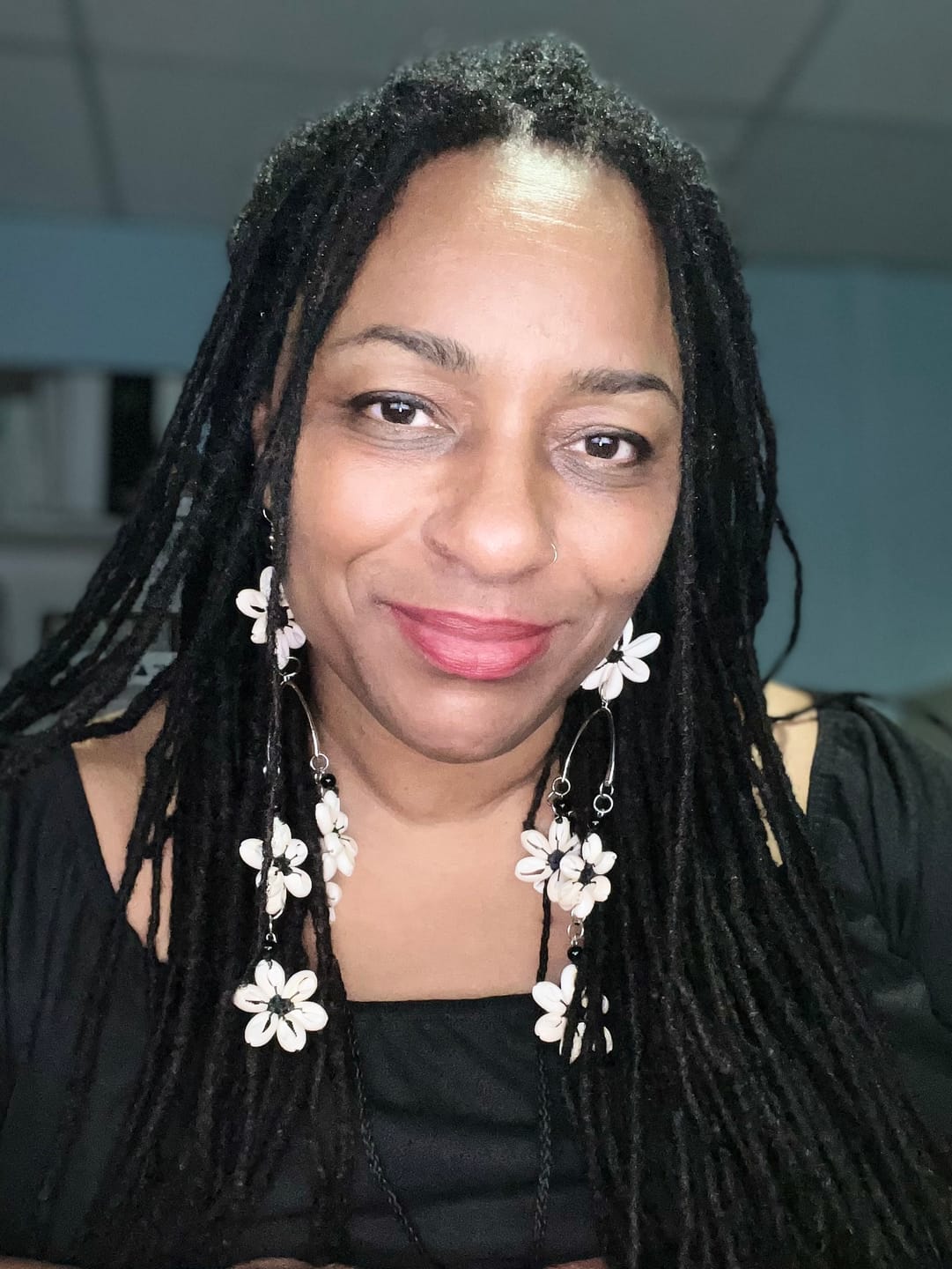Customer photo review of Ocean's Whisper Natural Cowry Shell Earrings