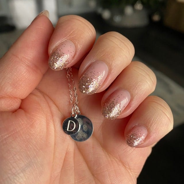 Customer photo review of Best Selling Paw Print Initial Necklace