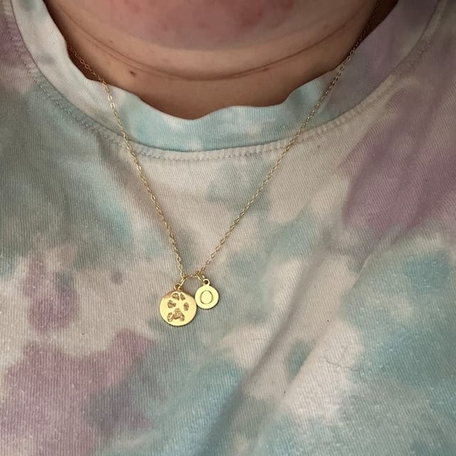 Customer photo review of Best Selling Paw Print Initial Necklace