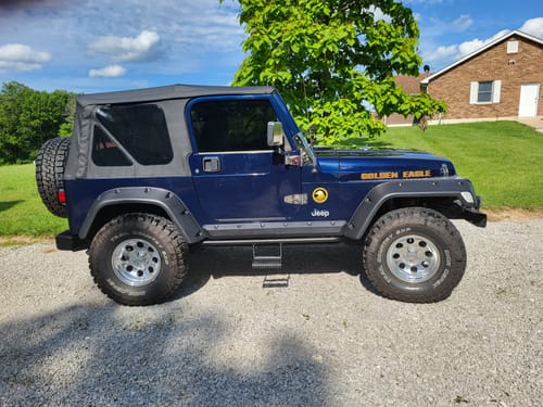 Customer photo review of N-Fab RKR Rails 97-06 Jeep Wrangler TJ/BJ 2 Door All - Tex. Black - 1.75in - w/ Detachable Steps