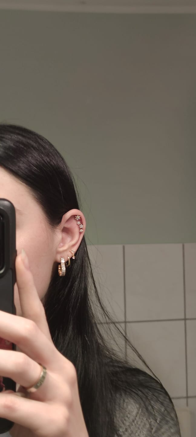 Customer photo review of Flowerish Piercing | Titan