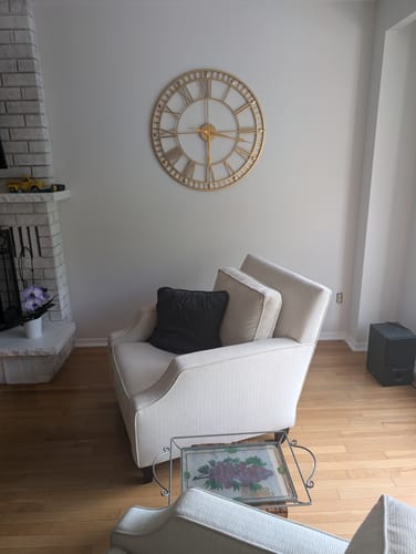 Customer photo review of 32" Gold Roman Numeral Metal Wall Clock - 82cm