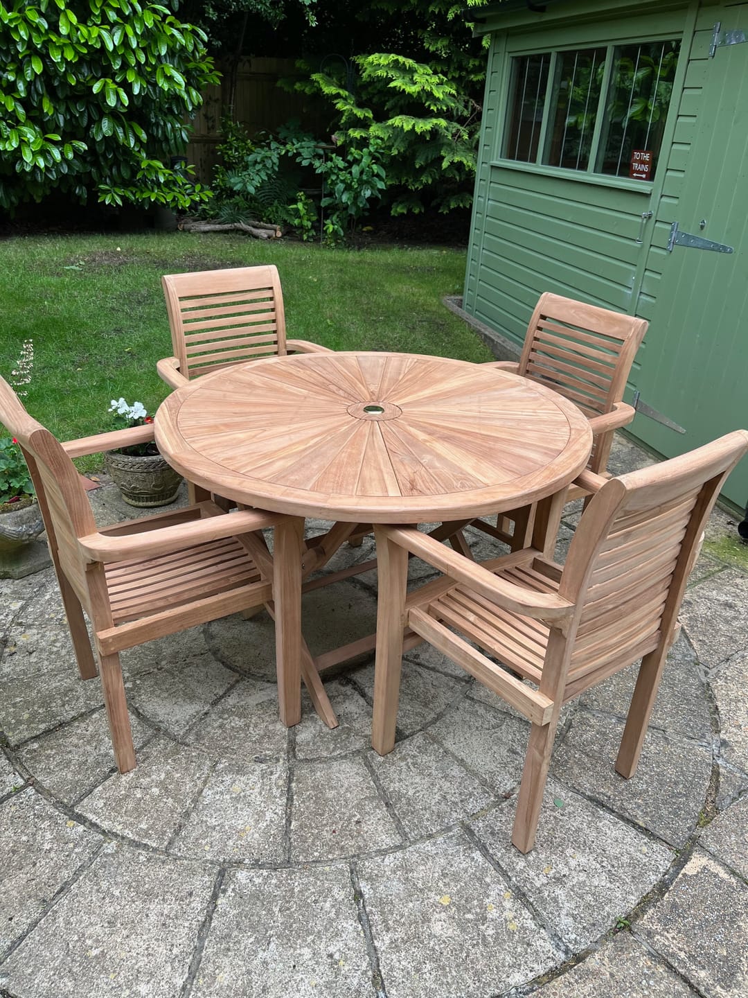 Customer photo review of Teak Garden Furniture Set 120cm Round Sunshine Table 4 x Oxford Stacking Chairs Cushions Included