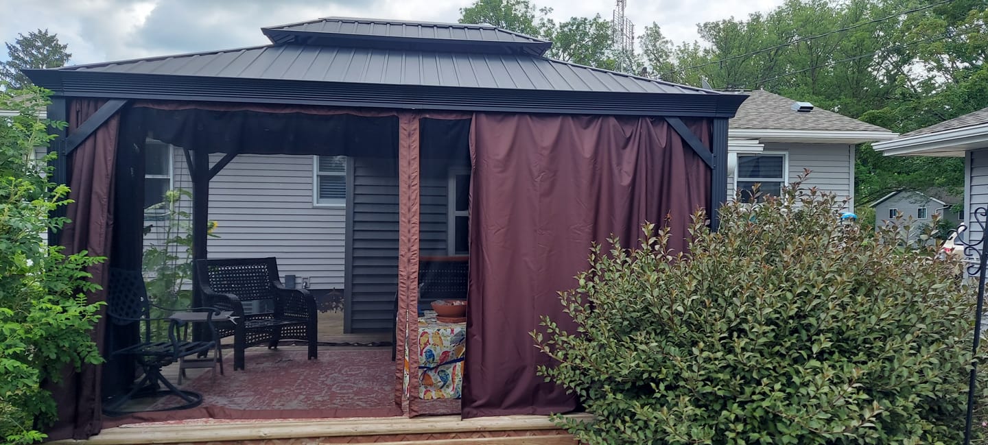 Customer photo review of Shade N' Shelters 10' x 14' Granite Peak Hardtop Gazebo Privacy Curtain with Hooks