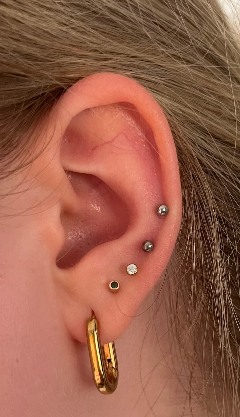 Customer photo review of Shining Point Piercing | Titan
