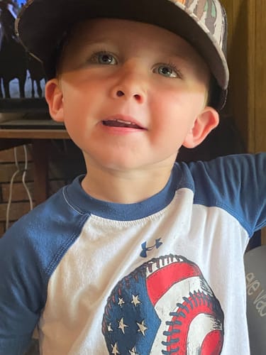 Customer photo review of Custom Leather Patch Trucker Hat - Richardson 112P