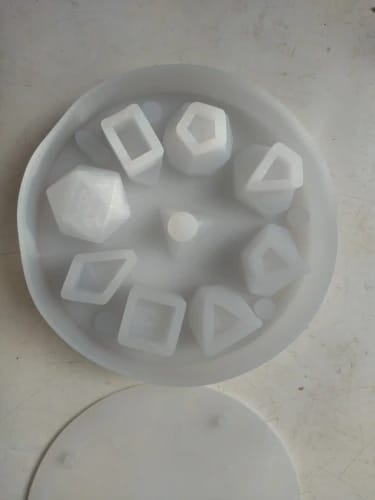 Customer photo review of Sharp Edge 9 Piece Polyhedral Dice Mold
