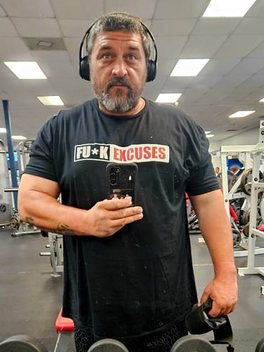 Customer photo review of Fu*k Excuses Tee Shirt