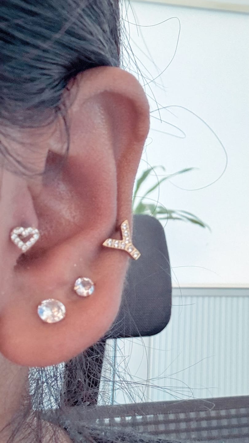 Customer photo review of Heart Piercing | Titan