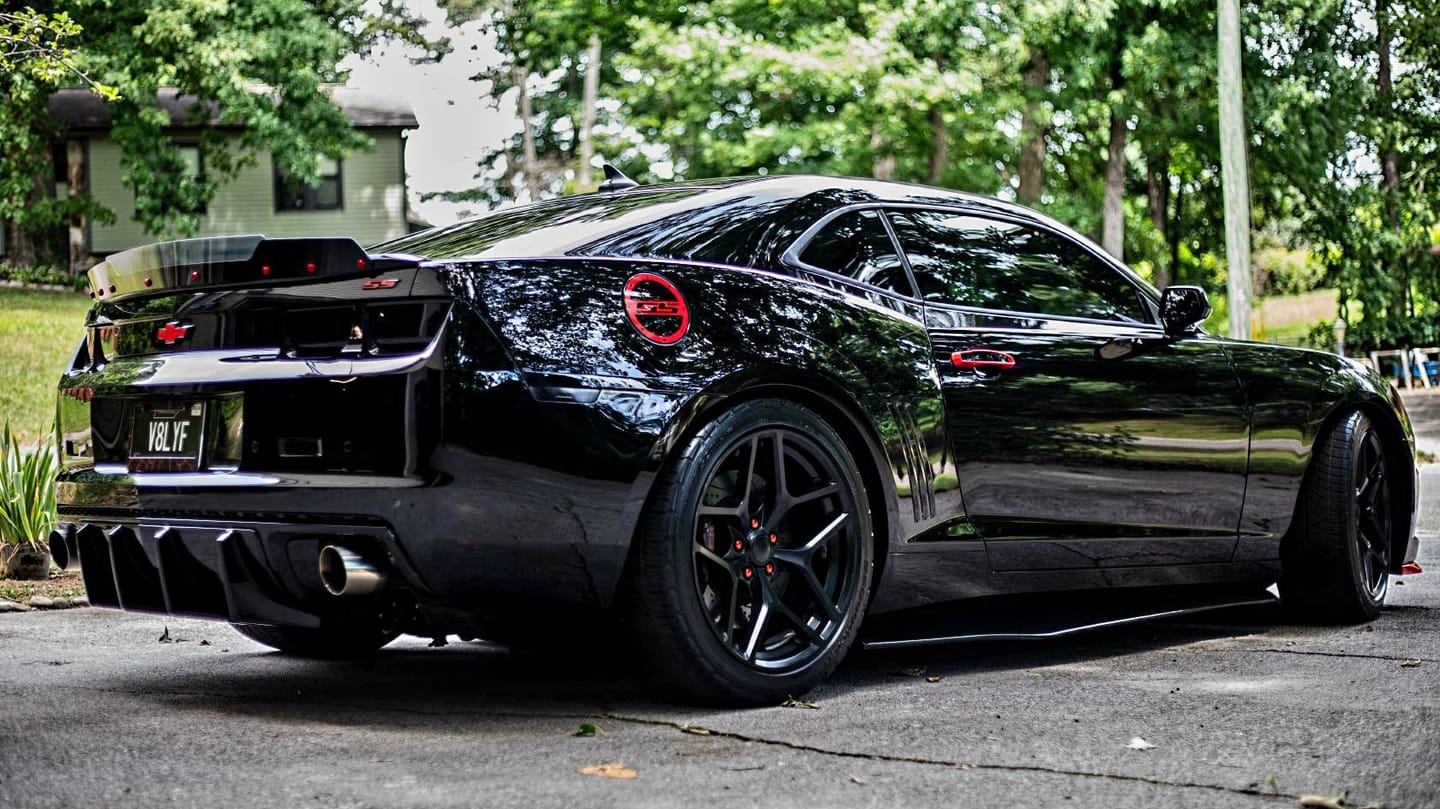 Customer photo review of PRE-ORDER 2010-2013 Chevy Camaro Evo Style Shark Fins Rear Diffuser Quad/Single Tips
