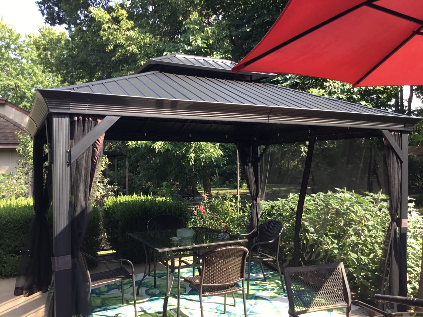Customer photo review of Shade N' Shelters 10' x 12' Granite Peak Hardtop Gazebo Privacy Curtain with Hooks