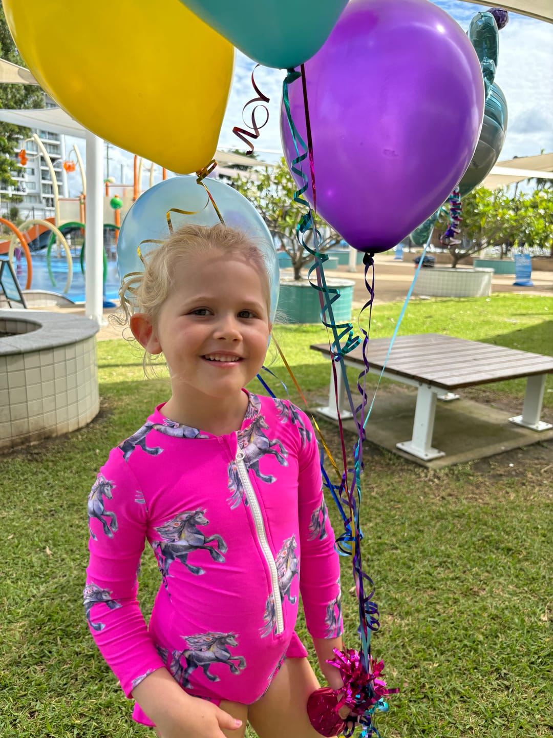Customer photo review of PREORDER Fluro Horses Girls Long Sleeve Zip Swimmers (Ships w/c 17th June)