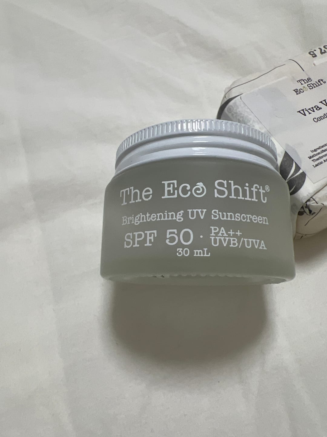 Customer photo review of Brightening UV Sunscreen & Skin Primer with SPF 50