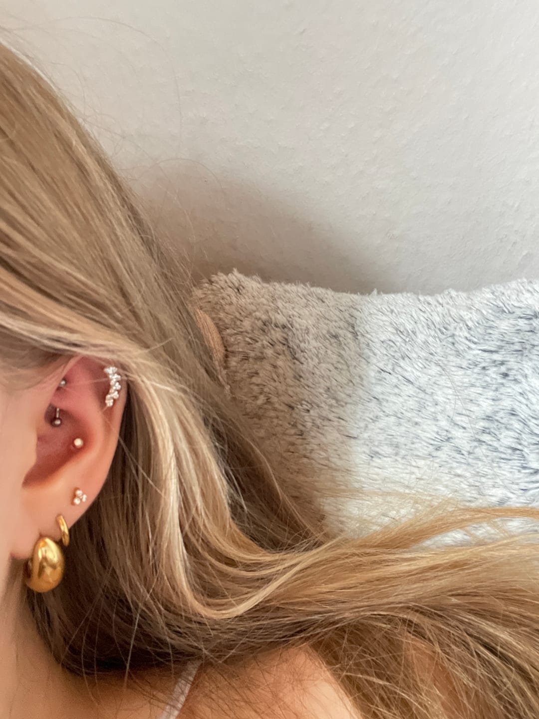 Customer photo review of Feather Piercing | Titan