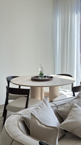 Customer photo review of Ariel Round Beige Travertine Dining Table with Three Legs (3 Sizes)