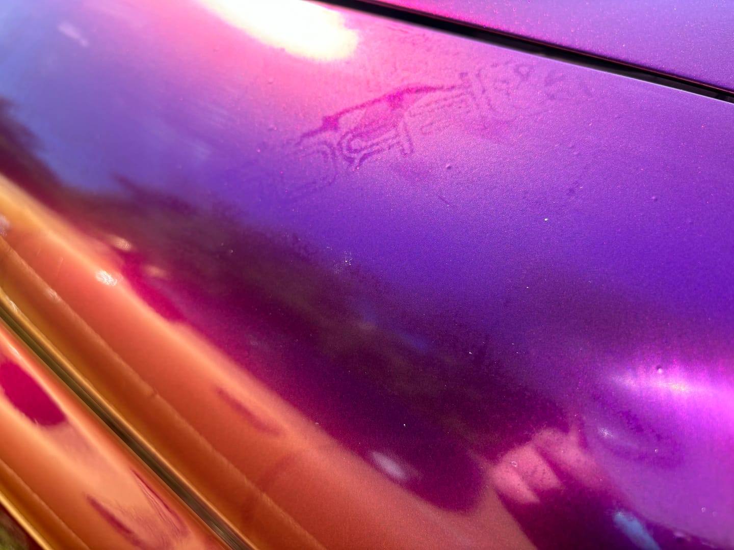 Customer photo review of Glossy Metallic Grape Purple Vinyl Wrap