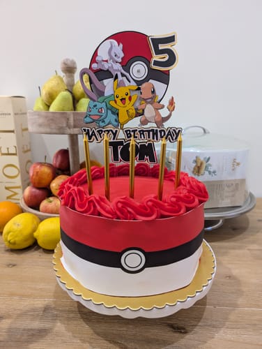 Customer photo review of Pokémon Let's Go! Poke Ball Inspired - Edible Icing Cake Wrap