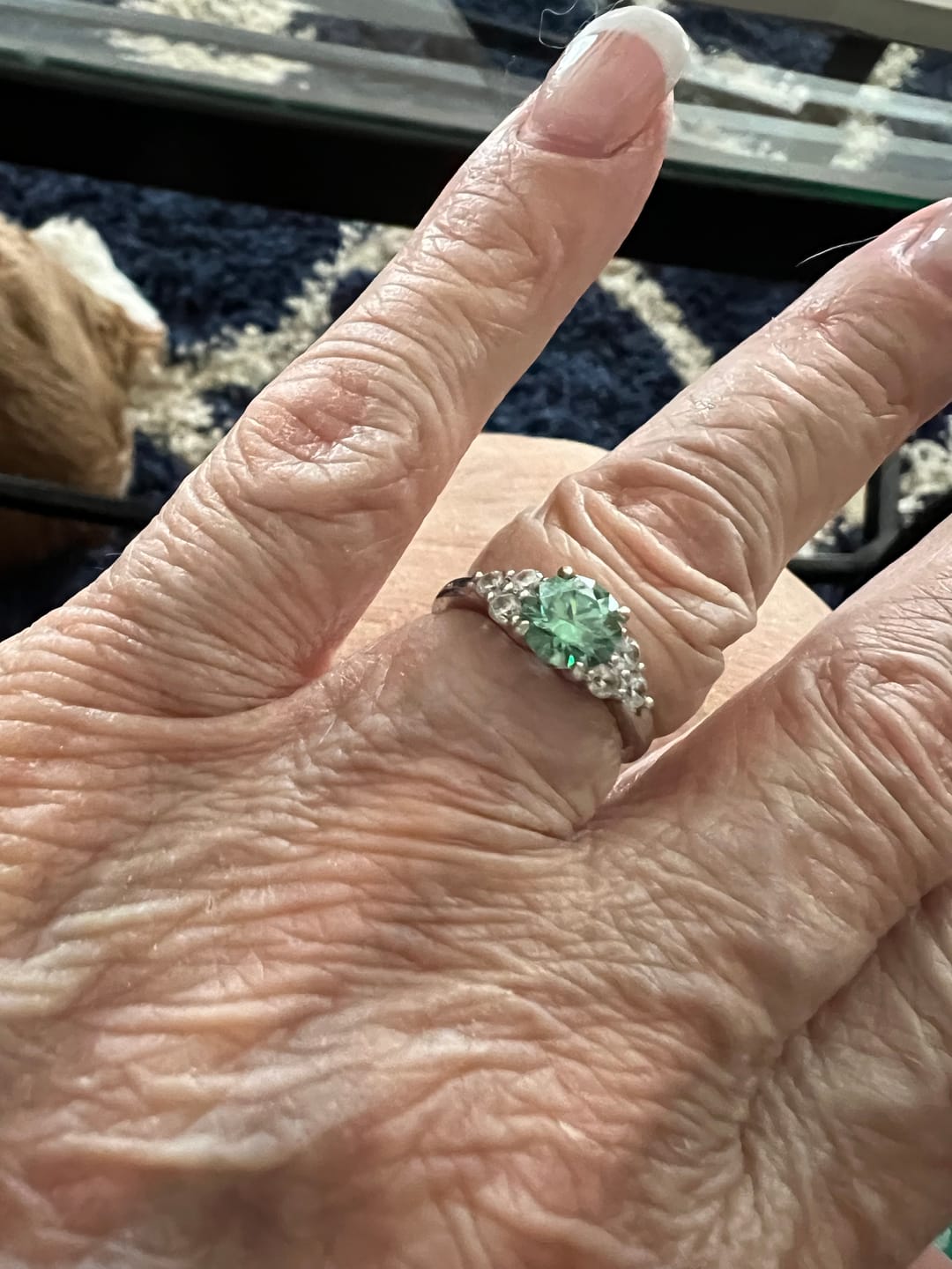 Customer photo review of Green Moissanite Side Stone Engagement Ring