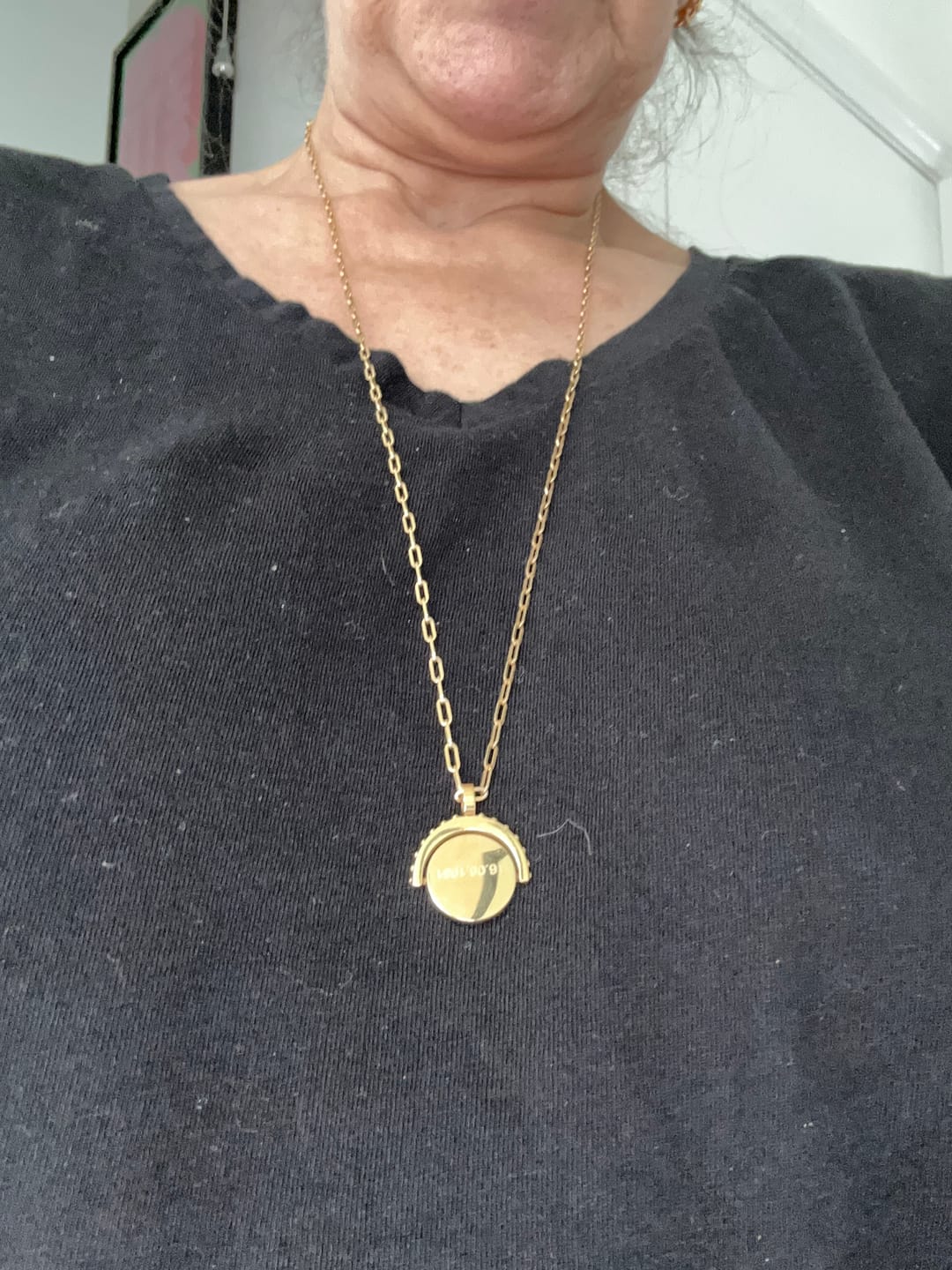 Customer photo review of Engravable Spinning Necklace