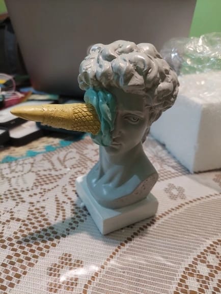 Customer photo review of In Your Face Resin Statue