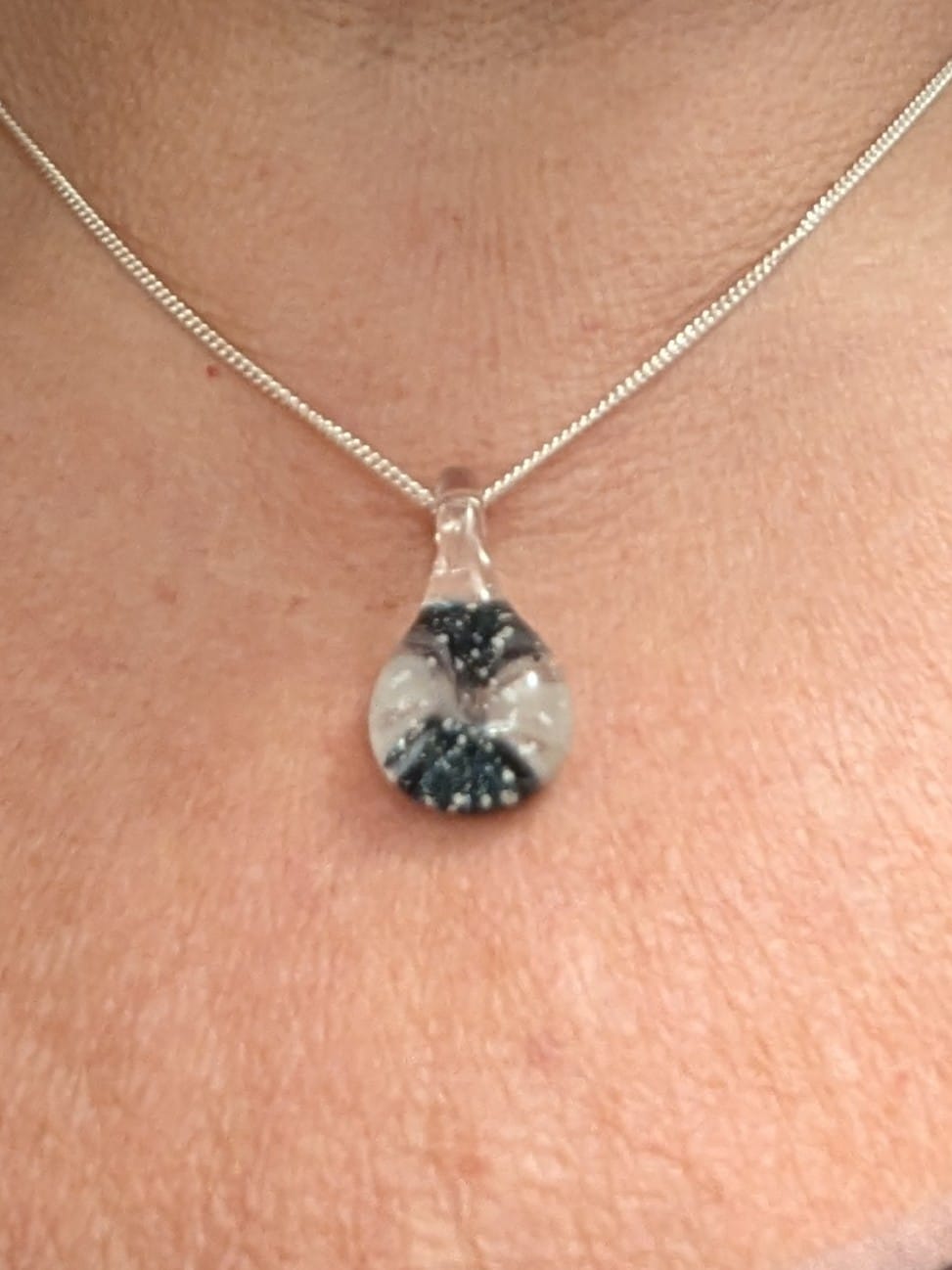 Customer photo review of Ocean Crash Pendant with Infused Cremation Ashes