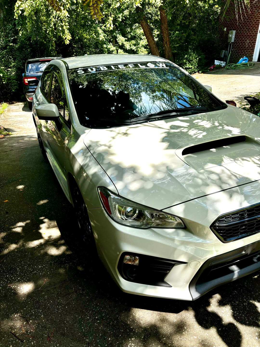 Customer photo review of SubieFlow Windshield Banners