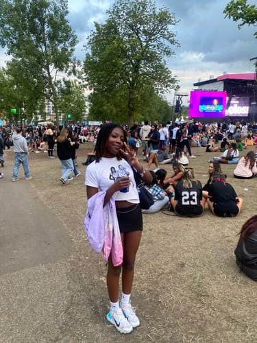 Customer photo review of 'After Party' baby tee