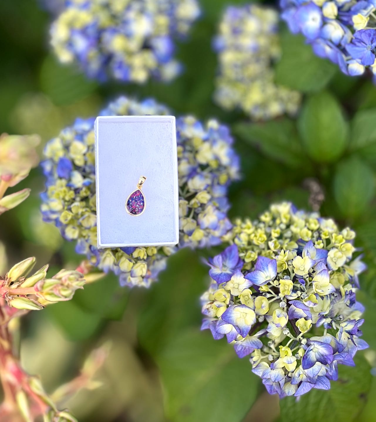 Customer photo review of Petite Pear Drop with Cremation Ashes