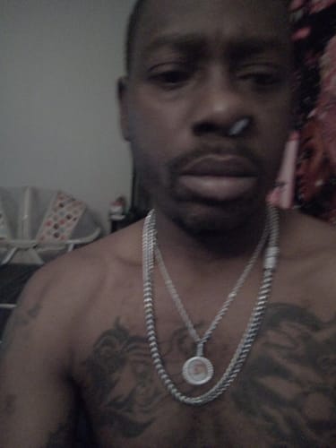 Customer photo review of Custom Round Iced Out Photo Pendants