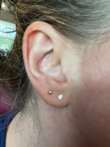 Customer photo review of 14k helen studs (3mm) + ball studs (3mm) + infinity hoops (10mm)