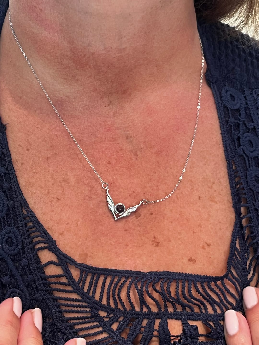 Customer photo review of Pure Angel Wings Projection Necklace