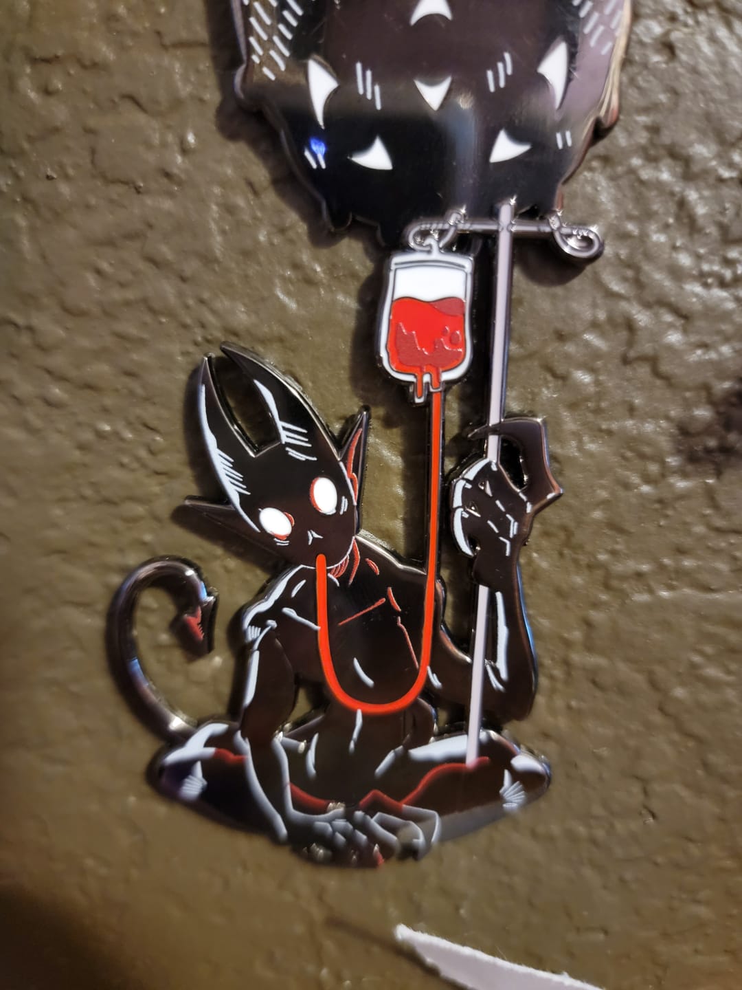 Customer photo review of Blood Bag Demon Enamel Pin