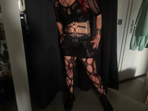 Customer photo review of Fishnet long sleeve hollow out see through mini dress goth Alternative Darkwave Fashion goth Emo Darkwave Fashion