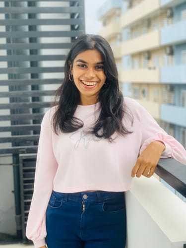 Customer photo review of Pink Kynd Glitter Pullover