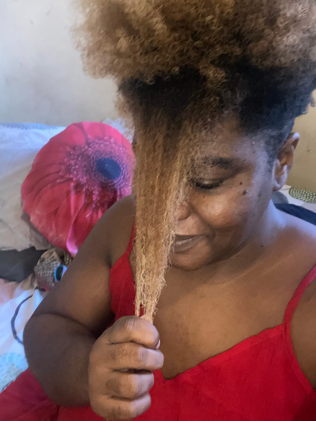 Customer photo review of Sérum Capiboost Hibiscus & Orties 120ml pour la pousse des cheveux bouclés frisés crépus