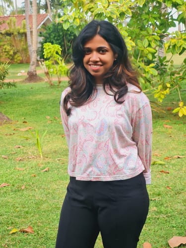 Customer photo review of Mosaic Magic Crop Long Sleeve Tee