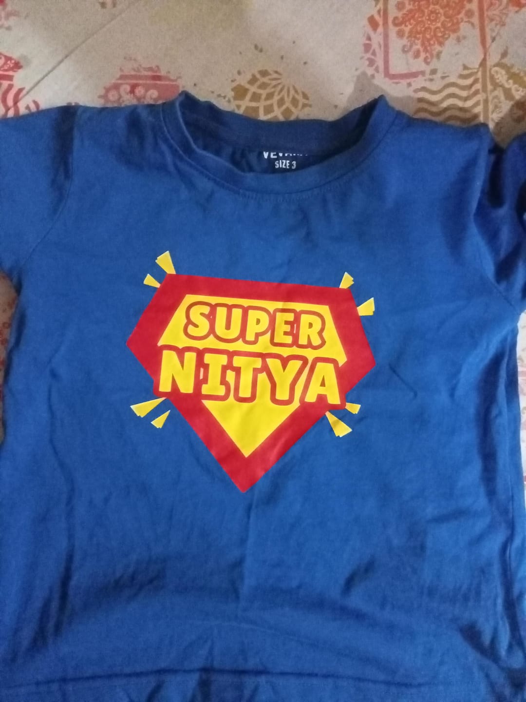 Customer photo review of Super With Custom Kid Name - Kids Tee